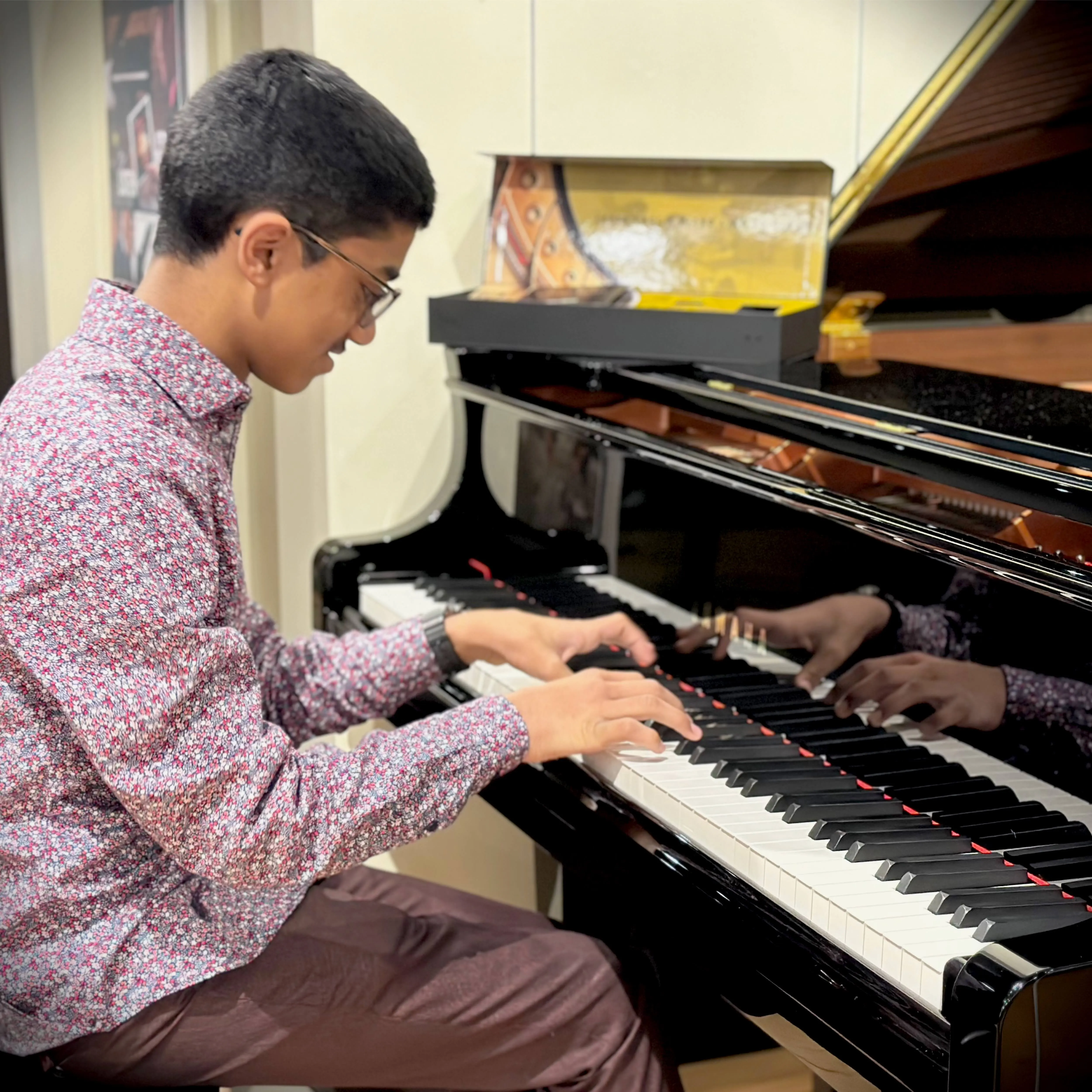 Ben playing a Yamaha grand